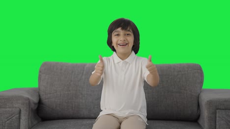 Indian-boy-showing-thumbs-up-Green-screen