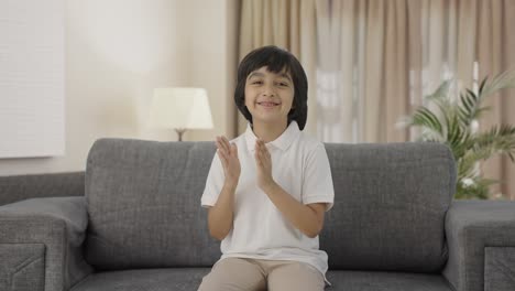 Happy-Indian-boy-clapping-and-appreciating