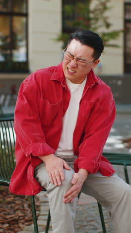 Asian-mature-man-suffer-from-painful-severe-knee-joint-ache,-leg-muscles-illness-cramps-rheumatism