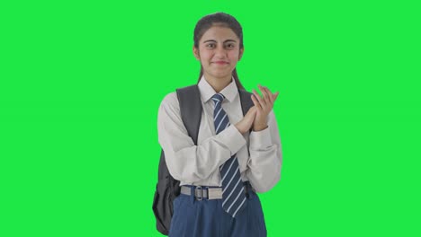 Happy-Indian-school-girl-clapping-and-appreciating-Green-screen