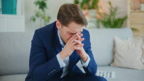 Portrait-of-Broken-Businessman-After-Loss