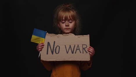 Upset-poor-toddler-child-girl-homeless-protesting-war-conflict-raises-banner-with-inscription-No-War