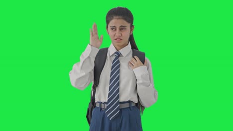 Indian-school-girl-disgusted-by-bad-smell-Green-screen