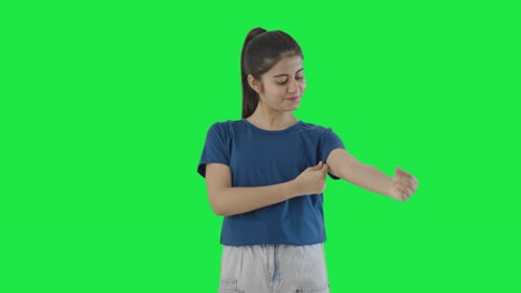 Happy-Indian-teenage-girl-getting-ready-for-going-out-Green-screen