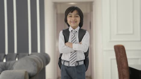 Indian-school-boy-standing-crossed-hands