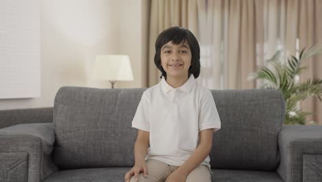 Happy-Indian-boy-smiling-to-the-camera