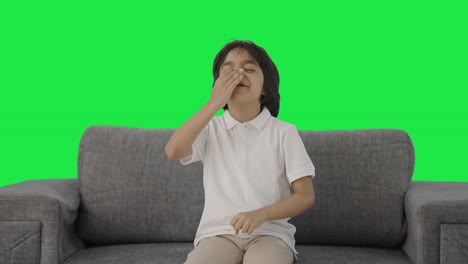 Sick-Indian-boy-suffering-from-cold-and-cough-Green-screen