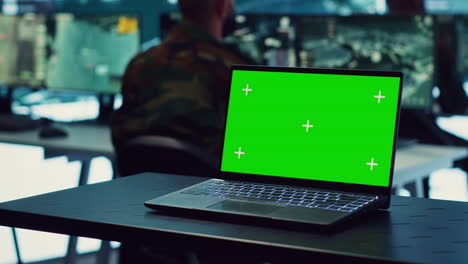 Laptop-showing-isolated-mockup-screen-in-army-base-of-operations