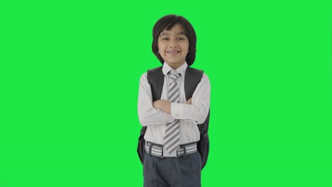 Indian-school-boy-standing-crossed-hands-Green-screen