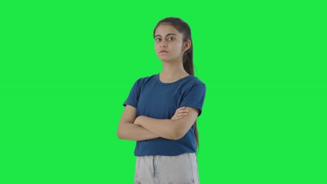 Portrait-of-Confident-Indian-teenage-girl-standing-crossed-hands-Green-screen