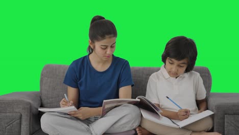 Indian-sibling-studying-at-home-Green-screen