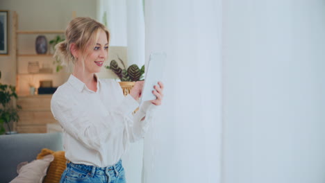 Concentrated-Businesswoman-by-Window