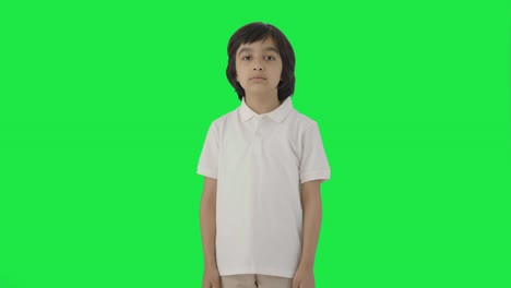 Serious-Indian-boy-looking-at-the-camera-Green-screen