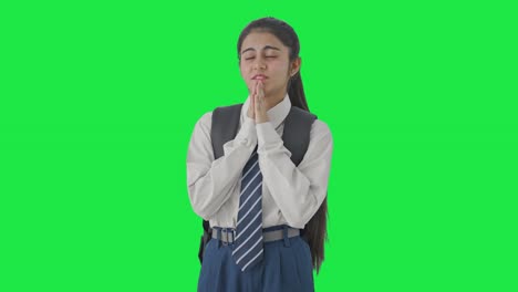 Indian-school-girl-praying-to-God-Green-screen