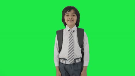 Happy-Indian-school-boy-smiling-to-the-camera-Green-screen