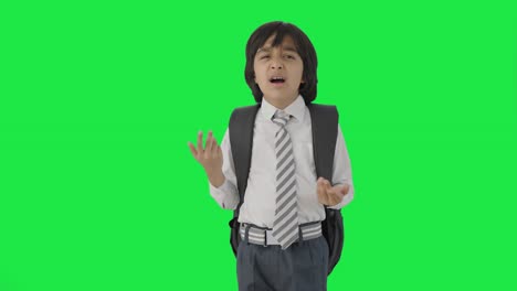 Angry-Indian-school-boy-shouting-on-someone-Green-screen