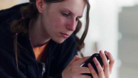 Portrait-of-a-Sad,-Delusional-Teenager-Reading-Negative-Comments-About-Her-on-Social-Media