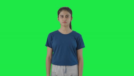 Indian-teenage-girl-staring-to-the-camera-Green-screen
