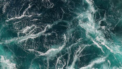 Blue-waves-of-water-of-the-river-and-the-sea-meet-each-other-during-high-tide-and-low-tide.