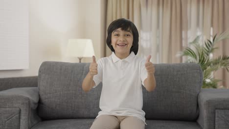 Indian-boy-showing-thumbs-up-to-the-camera