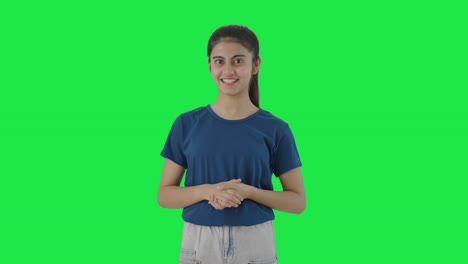 Happy-Indian-teenage-girl-talking-to-the-camera-Green-screen