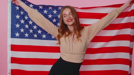 Cheerful-teen-girl-waving-and-wrapping-in-American-USA-flag,-celebrating,-human-rights-and-freedoms