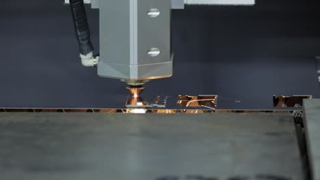 CNC-Laser-cutting-of-metal,-modern-industrial-technology.