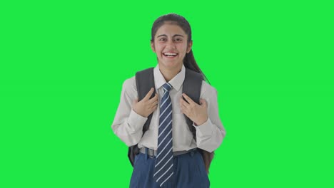 Happy-Indian-school-girl-laughing-on-someone-Green-screen