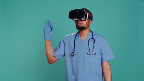 Nurse-wearing-virtual-reality-headset-remotely-operating-patient