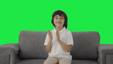 Happy-Indian-boy-clapping-and-appreciating-Green-screen