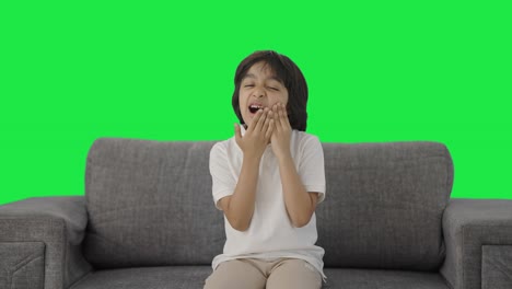 Sick-Indian-boy-having-a-toothache-Green-screen