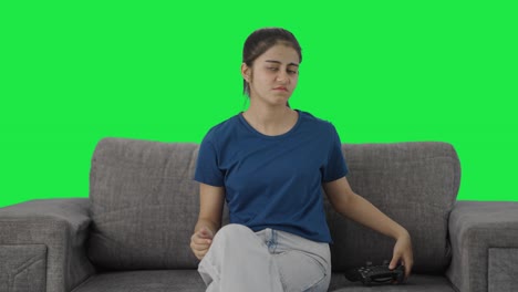 Competitive-Indian-teenage-girl-lost-the-video-game-match-Green-screen