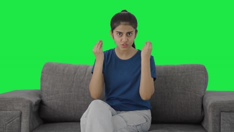 Indian-teenage-girl-shouting-on-the-camera-Green-screen