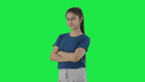 Portrait-of-Happy-Indian-teenage-girl-standing-crossed-hands-Green-screen