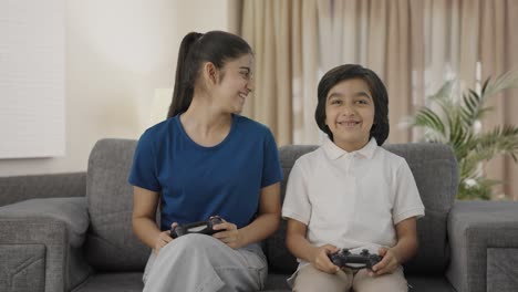 Indian-cousin-playing-video-games-happily