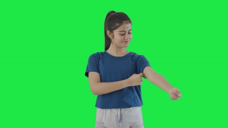 Indian-teenage-girl-getting-ready-for-going-out-Green-screen