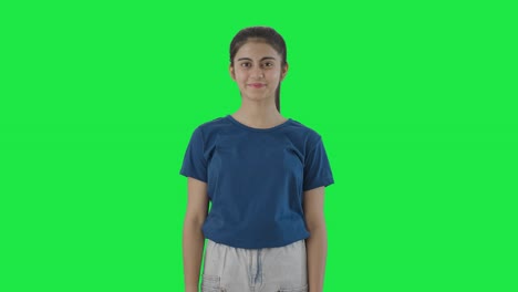 Happy-Indian-teenage-girl-smiling-to-the-camera-Green-screen