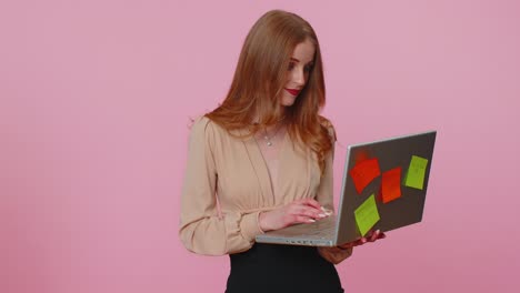 Exhausted-woman-freelancer-with-pasted-sticker-notes-using-laptop-computer,-concentration-problem