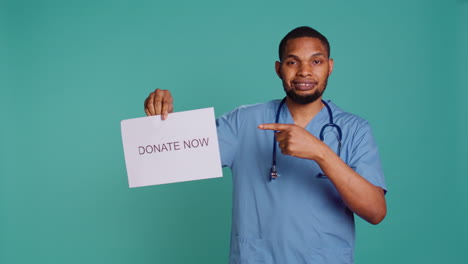 Healthcare-employee-requesting-philanthropic-donations-for-patients