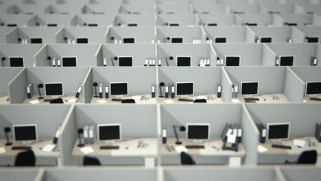 Aerial-view-of-the-corporate-open-room-with-white,-office-cubicles-and-employees-working-in-it.-Every-contemporary-cubicle-has-a-similar-design-–-the-desk-with-computer,-monitor,-telephone-and-chair.