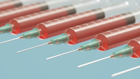 Seamless-looping-animation-with-syringes-arranged-in-a-row-with-needles-pointed-towards-camera.-Clear-plastic-disposable-syringes-filled-with-red-liquid-or-blood-against-blue-background.-4K