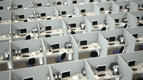 Aerial-view-of-the-corporate-open-room-with-white,-office-cubicles-and-employees-working-in-it.-Every-contemporary-cubicle-has-a-similar-design-–-the-desk-with-computer,-monitor,-telephone-and-chair.