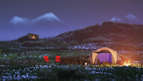 Summer-meadow-campsite-with-beautiful-mountain-view.-Camping-tent,-folding-chairs,-bikes-and-fireplace-among-green-grass-meadow.-Stylized-animation-of-camp-during-a-night.-Relax-in-nature.