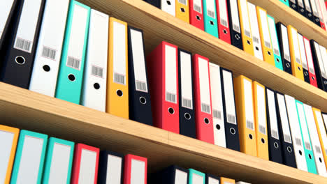 Close-up-on-the-row-of-the-file-black-binders-stacked-on-the-wooden-shelf.-Folders-are-used-to-help-store,-archive-and-organize-valuable-corporate-documents-like-reports-and-bills.