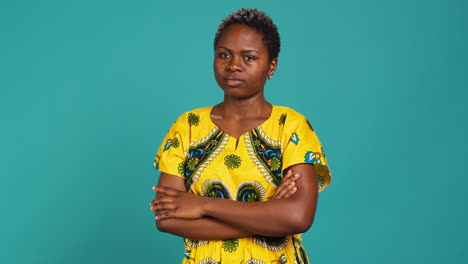 Portrait-of-sweet-woman-feeling-confident-in-traditional-native-pattern-attire