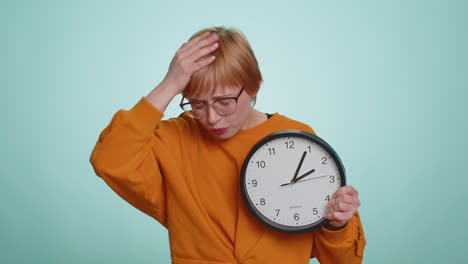 Woman-in-glasses-with-anxiety-checking-time-on-clock,-running-late-to-work,-being-in-delay,-deadline