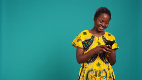 Modern-young-woman-browses-online-websites-on-her-phone