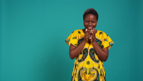 Woman-in-traditional-ethnic-clothing-drinks-a-sip-from-coffee-cup