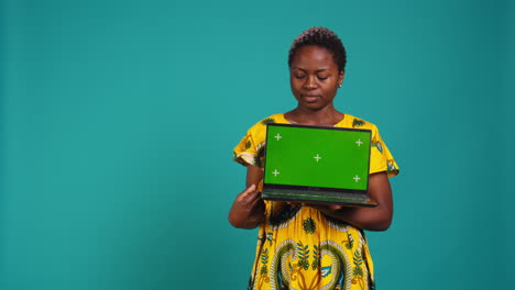 Confident-happy-person-posing-with-a-copy-space-mockup-on-laptop