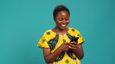 Modern-young-woman-browses-online-websites-on-her-phone